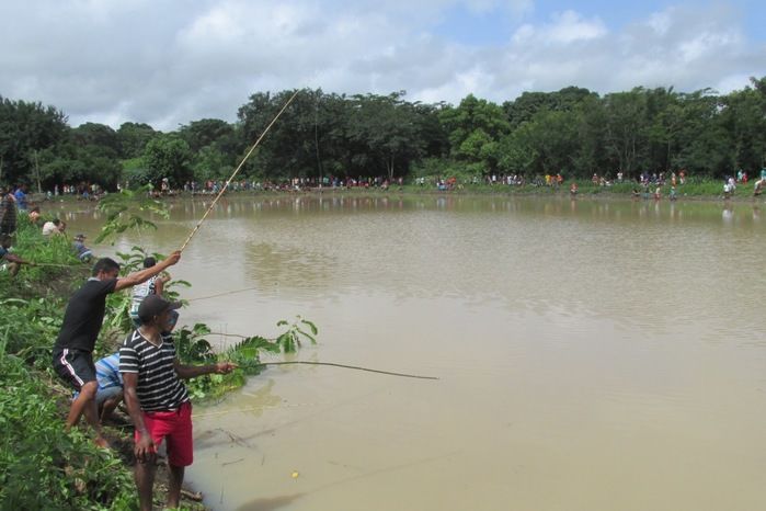Pesca coletiva movimenta a Sexta-feira Santa em Agricolândia - Imagem 21