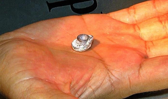 Projétil encontrado no local da tentativa de homicídio.  (Crédito: Kairo Amaral)