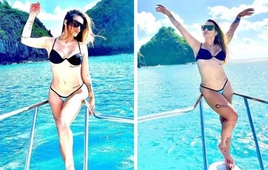 Cleo usa biquíni micro em passeio de barco durante lua de mel; fotos