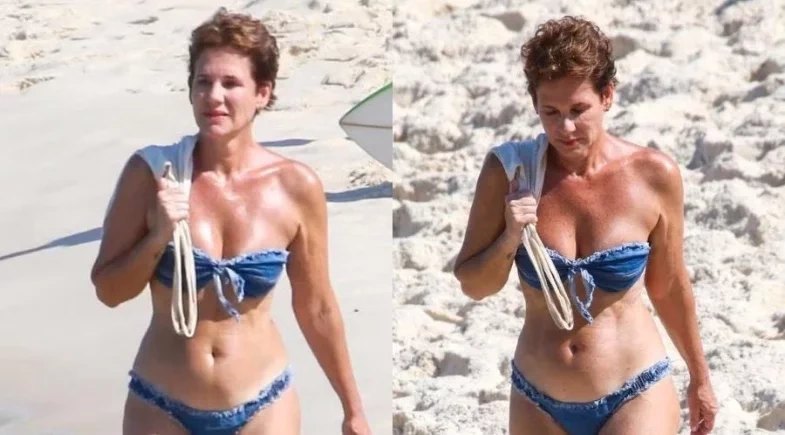 Ex-paquita Andréa Veiga exibe corpão aos 56 anos em praia do Rio