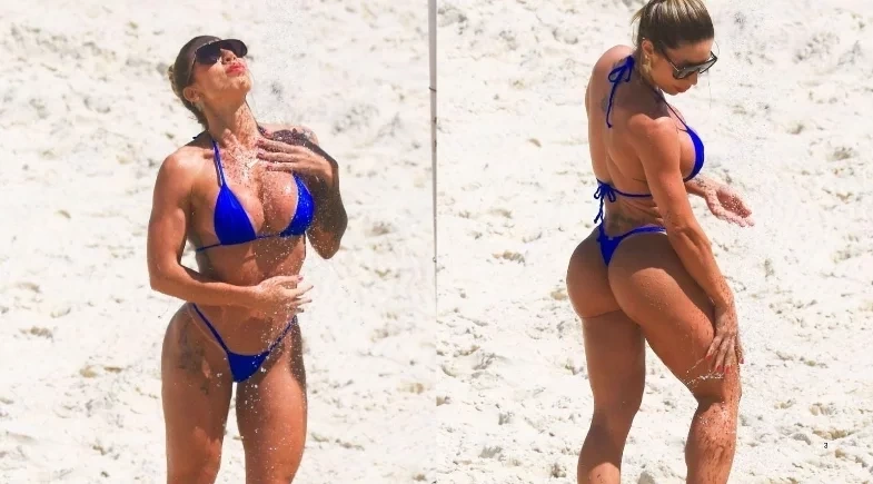 Tati Minerato toma banho de ducha em praia do Rio de Janeiro; fotos! 